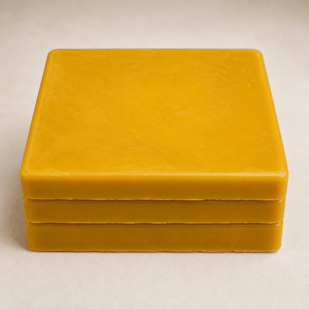 Stacked beeswax blocks