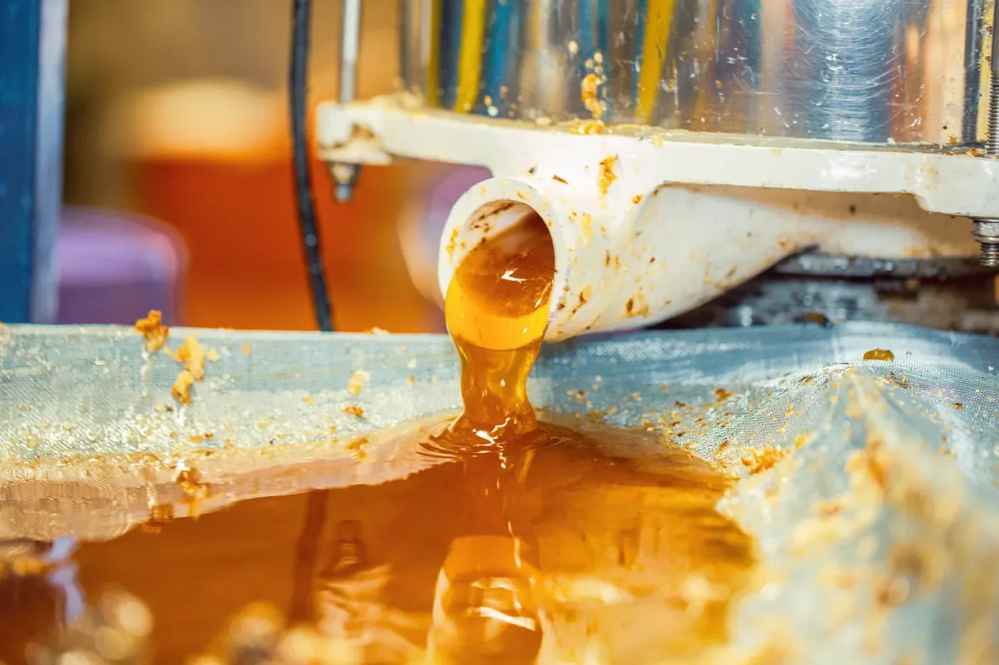 Honey being drawn off after processing