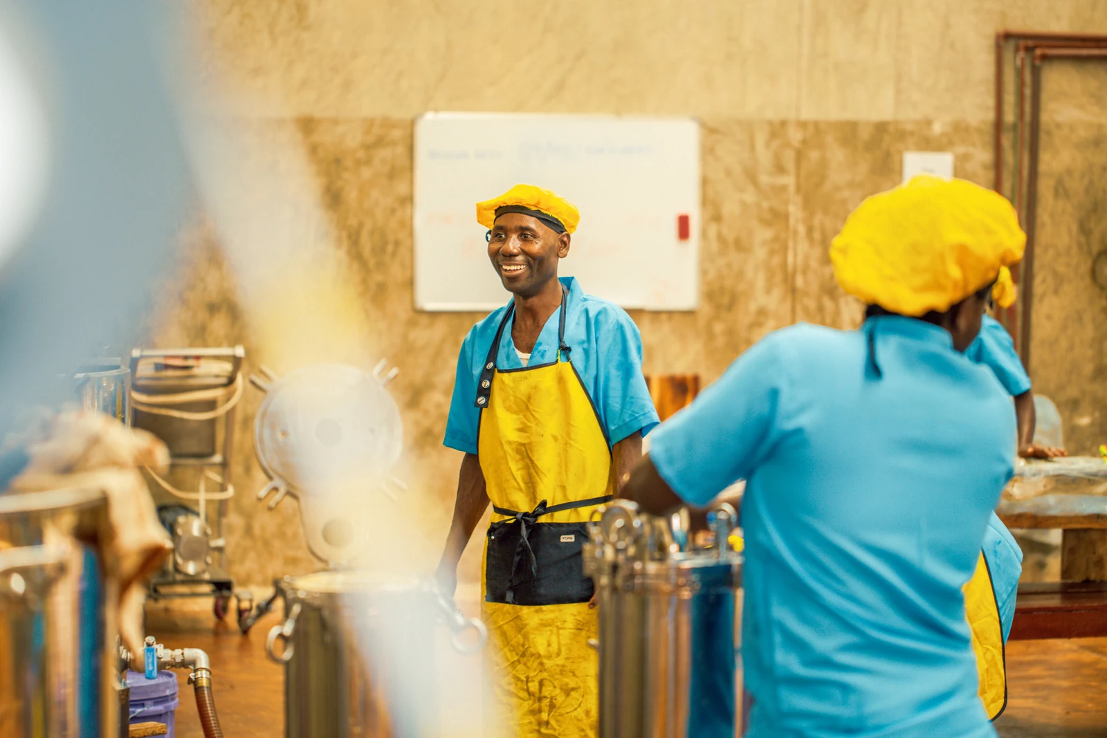 Upendo team members at work in the Kigoma processing facility